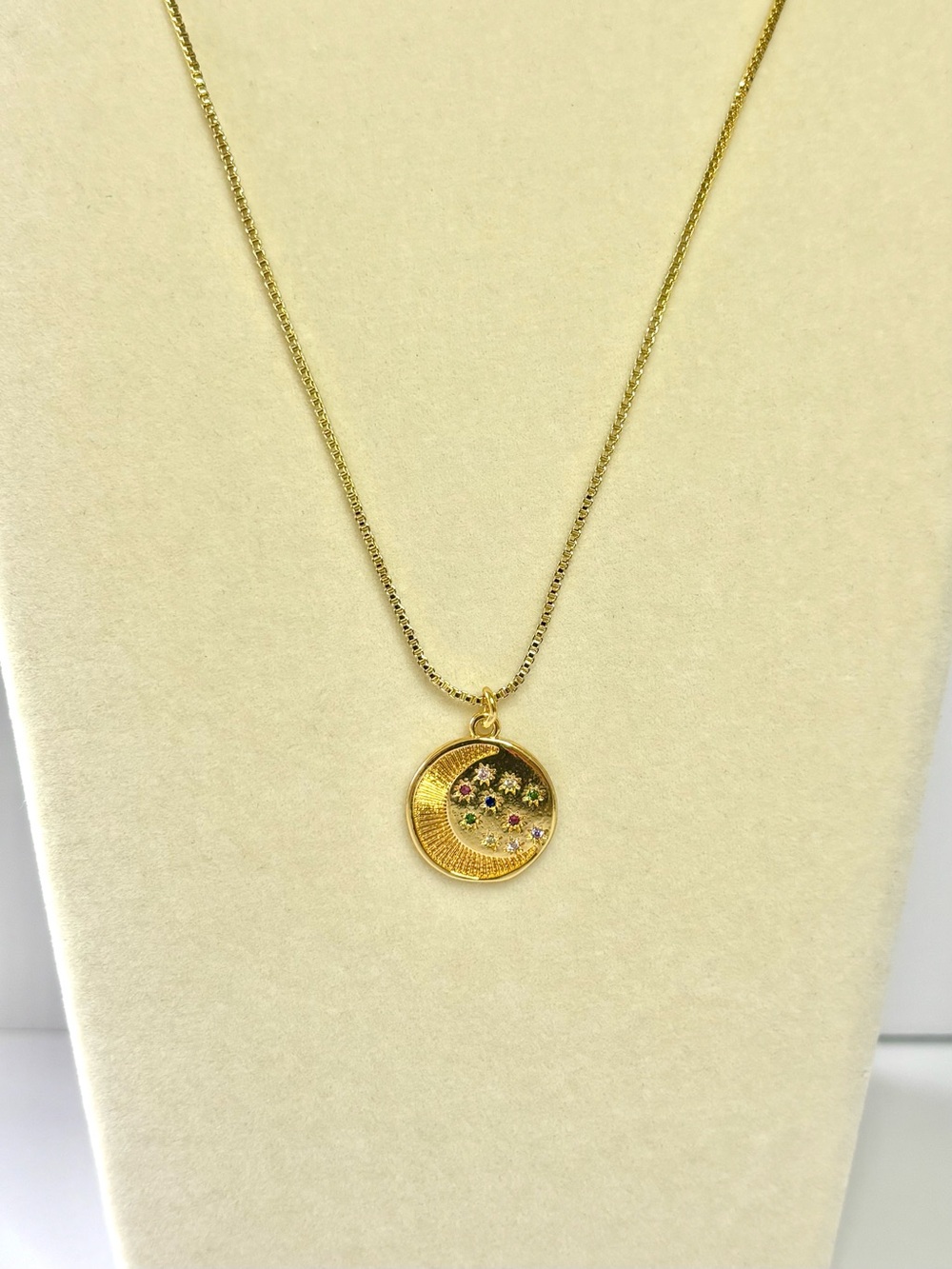 Gold moon medallion necklace